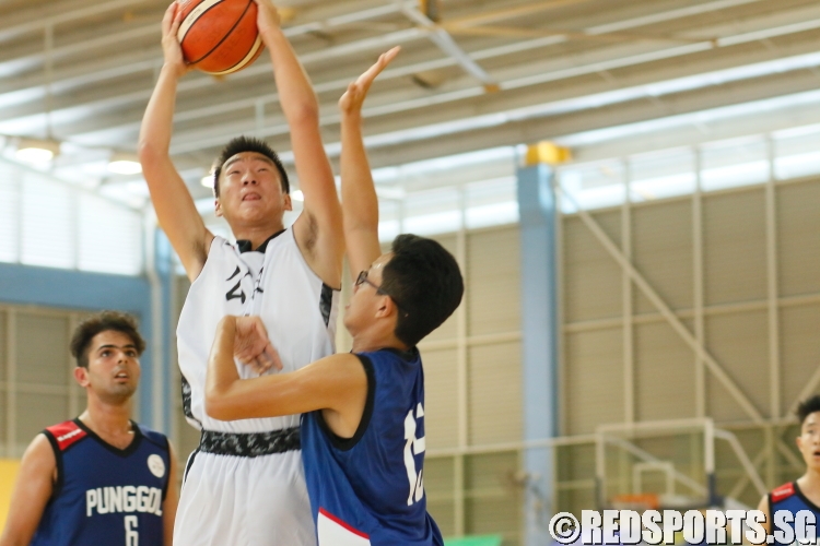 Jay (CHS #11) goes up strong against his opponent. (Photo  © REDintern Dylan Chua)