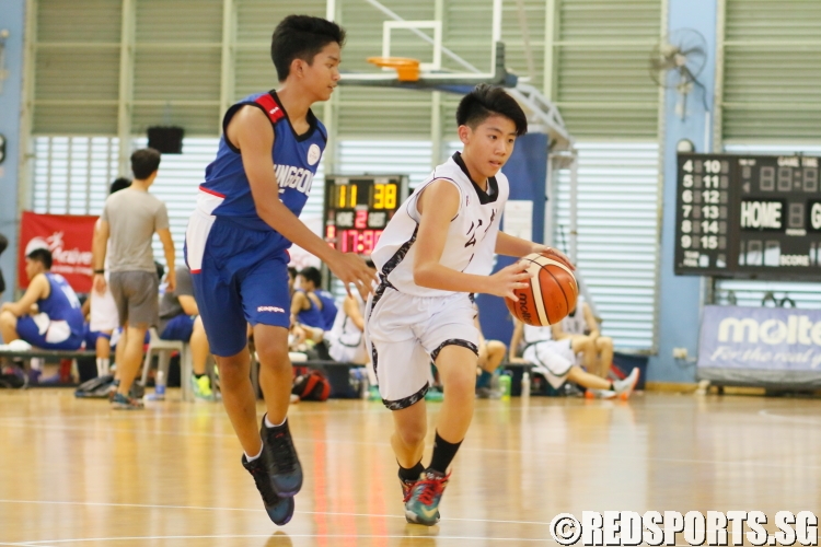 Justin Lee (CHS #1) attempts a left-handed drive to the basket. (Photo  © REDintern Dylan Chua)