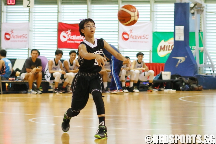 Bryan (NBS #9) fires a pass to a teammate. (Photo  © REDintern Chan Hua Zheng)