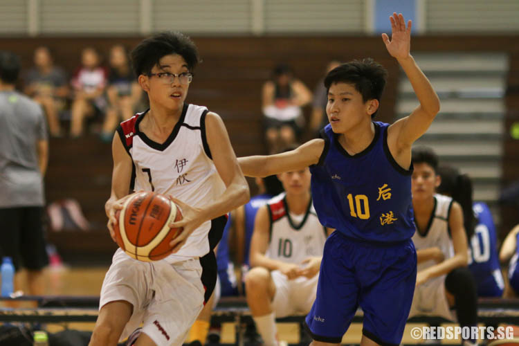 Axl Teo (AIS #7) drives past the defence before he goes for a lay-in. He scored a game-high 11 points in the victory. (Photo 1 © REDintern Chua Kai Yun)