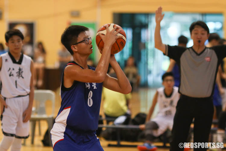 (MSHS #8) aims for a shot during free throw. (Photo 8 © REDintern Chua Kai Yun)