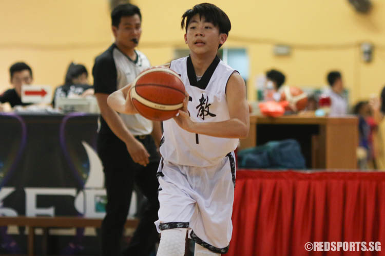 Justin Lee (CHS #1) passes the ball to his teammates. (Photo 9 © REDintern Chua Kai Yun)