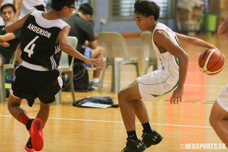 Eugene Junior (CCS #4) executes a wraparound upon meeting his opponent. He scored a game high 13 points in the victory. (Photo 1 © REDintern Chua Kai Yun)