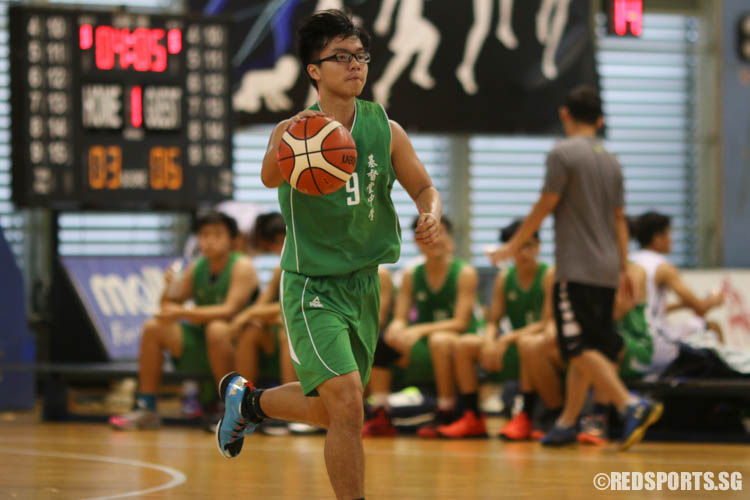 Aw Kai Jun (CCSS #9) drives up the court. (Photo 5 © REDintern Chua Kai Yun)