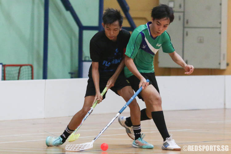 Oak Min Paing (HG #4) steals possession of the ball from his opponent Muhammad Abdul Raziq B Abdul A (NB #13). (Photo 5 © Chua Kai Yun/Red Sports)