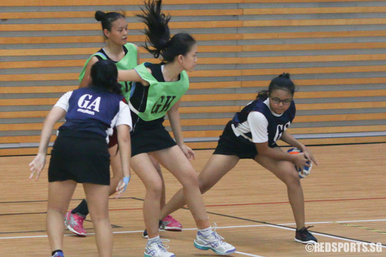 GS of Naval Base guards the ball against her opponent. (Photo 4 © REDintern Chua Kai Yun)