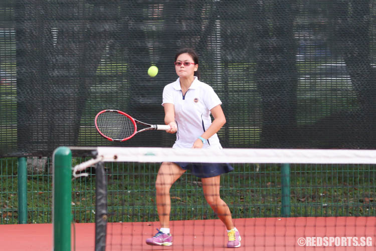 Tamara Tan of Methodist Girls’ School plays a forehand against Meg Ang of Raffles Girls’ School. Tan lost the match 2-6, 4-6. (Photo 2 © Chua Kai Yun/Red Sports)
