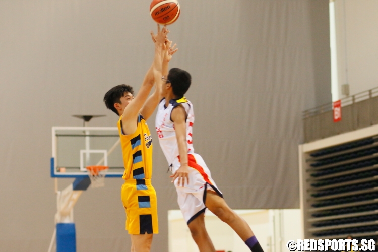 Xavier Ng (Fairfield #13) has his shot blocked. (Photo 19 © Dylan Chua/Red Sports)