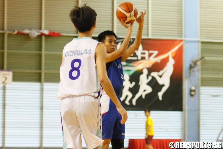 Seah Jin Yong (Woodgrove #8) pulling up for three. (Photo  © Chan Hua Zheng/Red Sports)