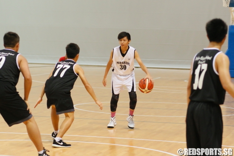 Low Zheng Ming (#30) surveying the ACS(I) defense for an opening. He scored 2 3-pointers en route to a game-high 12 points in the victory. (Photo  © REDintern Chan Hua Zheng)
