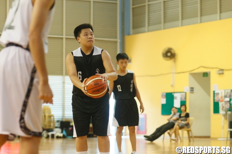 Cedric Cheo Zhang Keat (Anderson #6) attempts a free-throw. (Photo 12 © Dylan Chua/Red Sports)