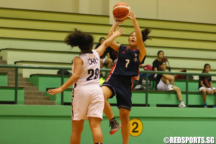 Reanne Ching (Zhonghua #7) rises for a lyup over her defender. She had 13 points in the game. (Photo  © Chan Hua Zheng/Red Sports)