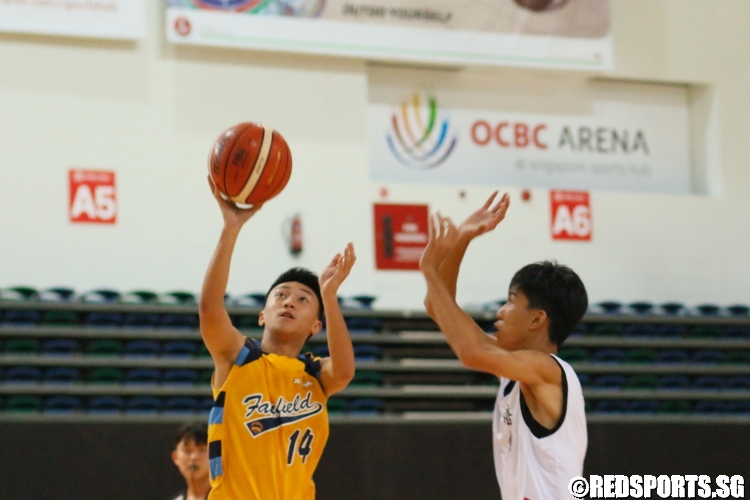 Leon Lai (Fairfield #14) attempts a shot against Pei Cai. (Photo  © Dylan Chua/Red Sports)