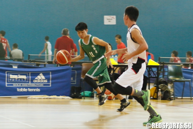 Terry Lim (JV #11) slashing to the hoop against the New Town defense. He had a game-high 15 points in the victory. (Photo  © Chan Hua Zheng/Red Sports)