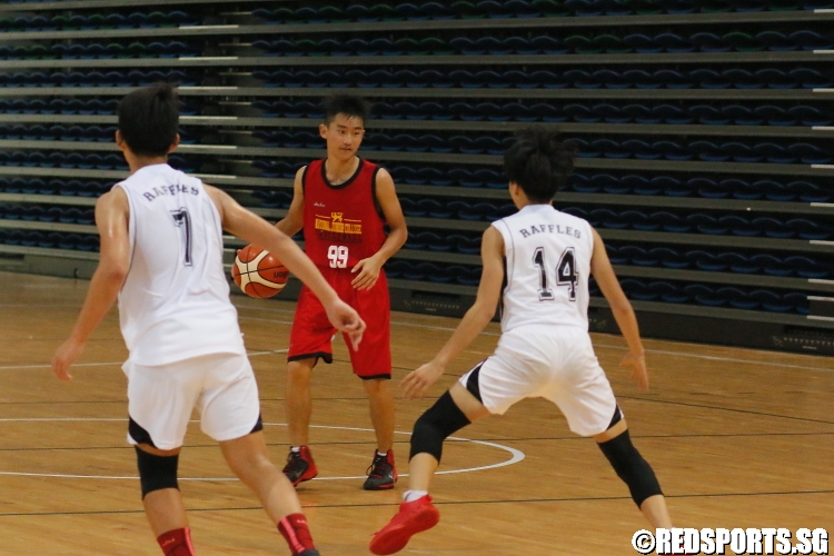 Nicholas Gao Lu Xin (NJC #99) surveys the RI defense for an opening. (Photo  © Chan Hua Zheng/Red Sports)