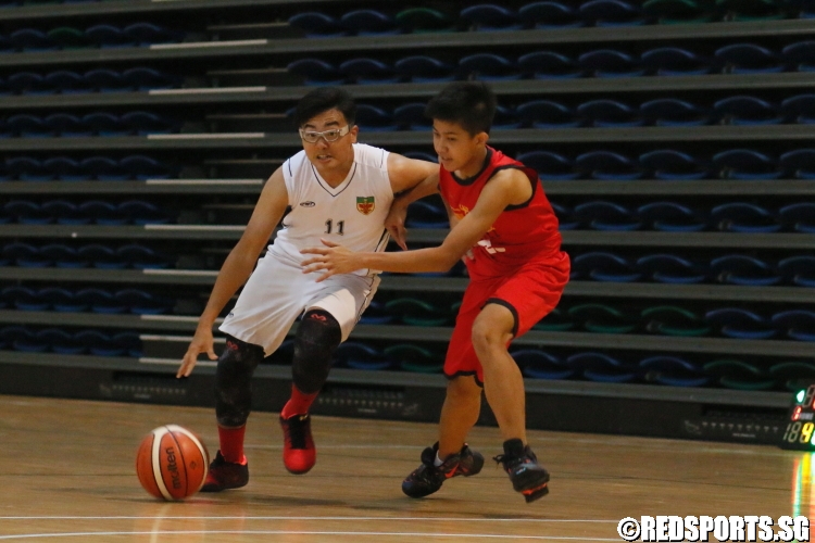 Adam Harith (RI #11) driving against his defender. (Photo  © Chan Hua Zheng/Red Sports)