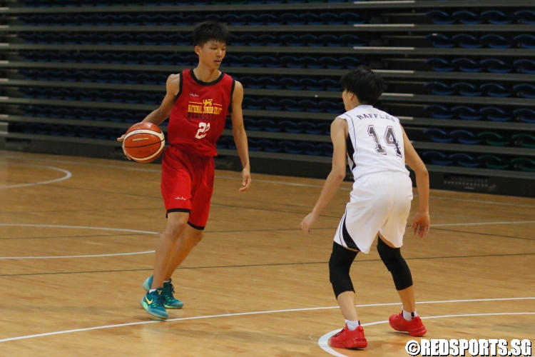 Huang Yifan (NJC #22) attempting to drive by his defender. He scored a game-high 16 points in the victory. (Photo  © Chan Hua Zheng/Red Sports)