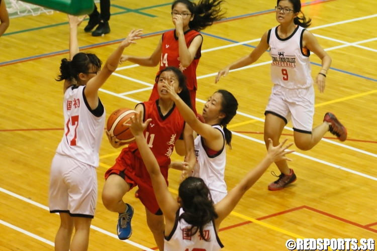 Julie (Mayflower #11) attemps a layup in traffic. She finished with a team-high 6 points. (Photo  © Chan Hua Zheng/Red Sports)