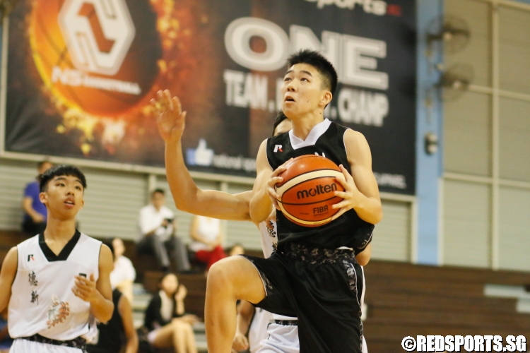 Travis Thong (CHS #3) rising for a layup on a fast break. He finished with 12 points in the game. (Photo  © Chan Hua Zheng/Red Sports)