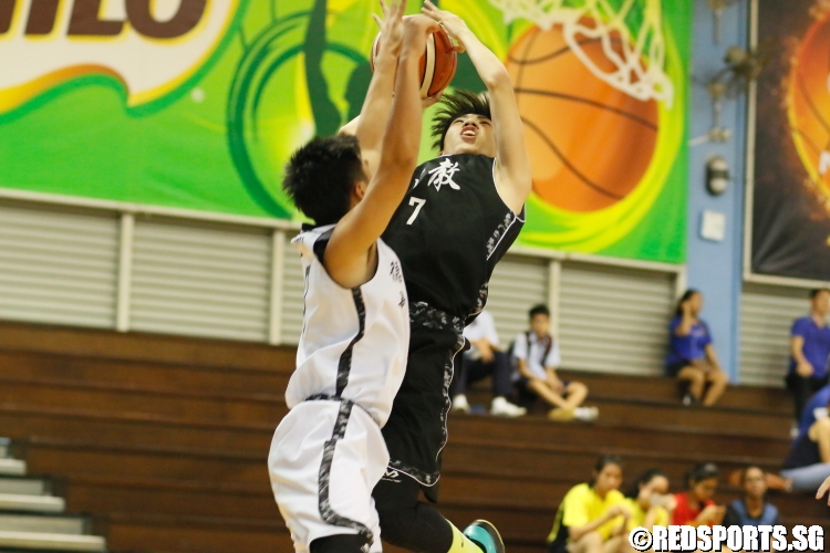 Joshua Lim (CHS #7) finds his shot heavily contested by his defender. (Photo  © Chan Hua Zheng/Red Sports)