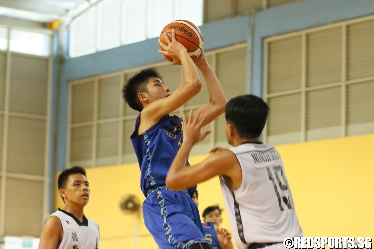 Dillion Yap (PHS#23) rises up for a shot over the North Vista defense. He had a team-high 13 points in the game. (Photo  © Chan Hua Zheng/Red Sports)
