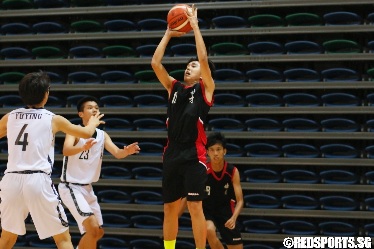 Wee Zhi Zhong (PCS #12) rises for a jumpshot over the defense. (Photo  © Chan Hua Zheng/Red Sports)