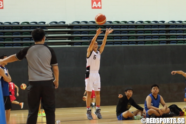 #6 of Queenstown attempts a corner three. (Photo  © Chan Hua Zheng/Red Sports)