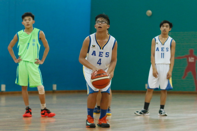 (AES #4) attempts a free-throw. (Photo  © REDintern Dylan Chua)
