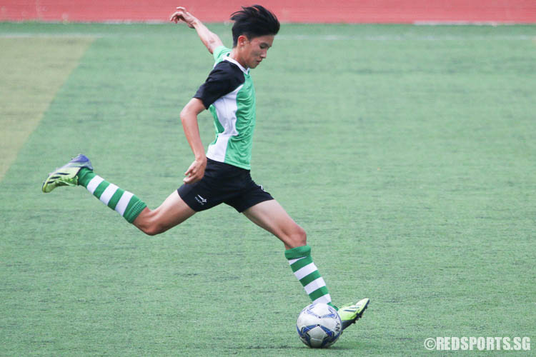 Kim Jing Zhe (TPJC #16) fires a kick. (Photo © Chua Kai Yun/Red Sports)