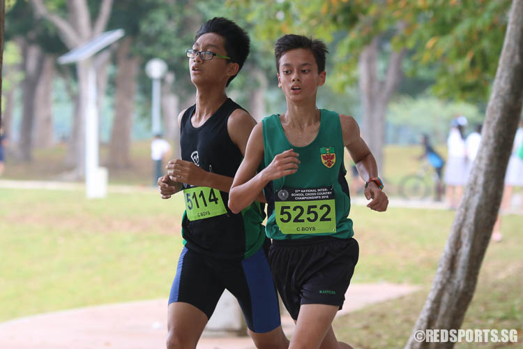 Gabriel Soon (#5114) of Evergreen Sec and Christoffer Eilersten (#5252) of RI in action in the 3.65km route at the 57th National Cross Country Championships. Soon was in the seventeenth position with a timing of 14:18.39, while Eilersten was the twenty first with a timing of 14:29.00. (Photo © Chua Kai Yun/Red Sports)