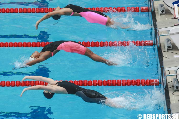 Mar'atus N Amjah, AA Istri Kania K Ratih and An Hsu (top to bottom) dive into the pool to begin the women's 13 & over 200m backstroke heat 5 prelims. (Photo © Soh Jun Wei/Red Sports)