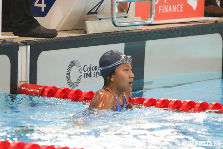 Rae Low reacts after her 200m butterfly race. She finished first in the 12 year old age group with a timing of 2:39.58. (Photo 7 © Chua Kai Yun/Red Sports)