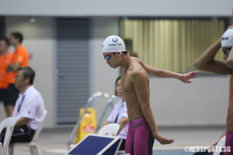 Owen Teo prepares for his 100m backstroke event. He finished second in the 13-14 age group with a timing of 1:03.66. (Photo © Chua Kai Yun/Red Sports)