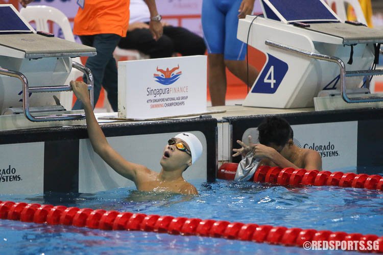 Nicholas Cheong reacts after his 200m breaststroke event. He finished first in the 13-14 age group with a timing of 2:36.50. (Photo © Chua Kai Yun/Red Sports)