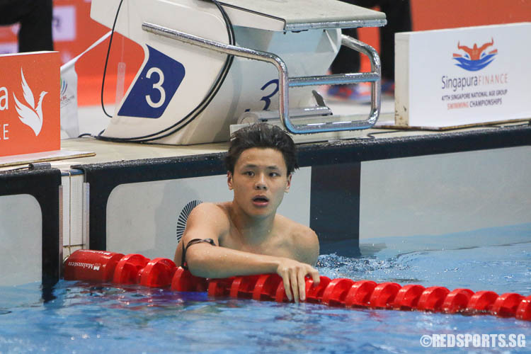 Dylan Koo, 17, reacts after his 50m freestyle race. He finished first in the 15-17 age group with a timing of 23.48. (Photo © Chua Kai Yun/Red Sports)