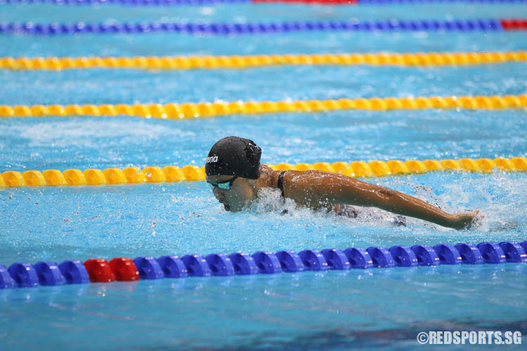 Nicholle Toh, 15, in action in the 100m butterfly race. She finished second in the 15-17 age group with a timing of 1:01.44.(Photo © Chua Kai Yun/Red Sports)