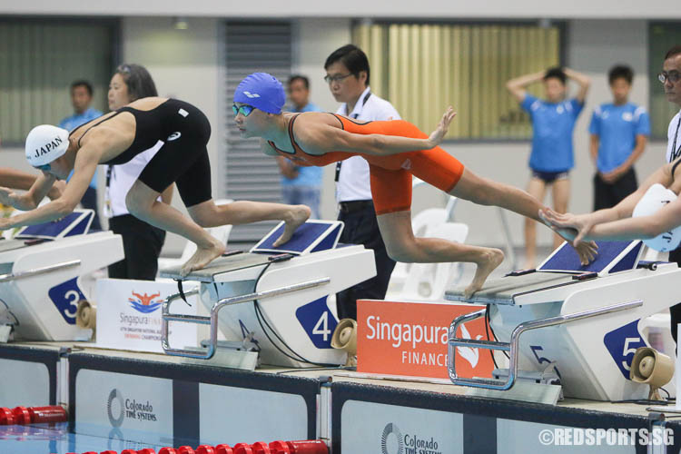 Gan Ching Hwee, 13, diving in during her 100m freestyle event. She finished second in the 13-14 age group with a timing of 59.24. (Photo © Chua Kai Yun/Red Sports)