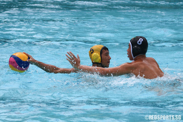 Benedict Ong (ACSI #5) controls the ball against Kyran Teo (RI #8). (Photo 4 © Chua Kai Yun/Red Sports)