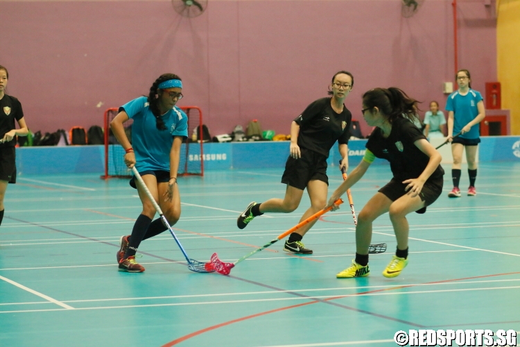 A CHIJ St Theresa's Convent players attempts to get around her opponent. (Photo 7 © Dylan Chua/Red Sports)