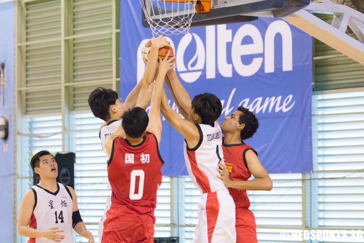 Players from both schools go for the rebound. (Photo 3 © Jerald Ang/Red Sports)