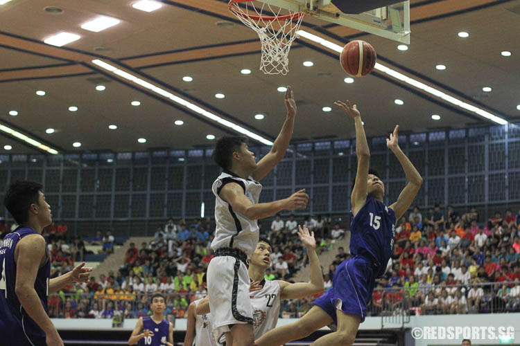Gabriel Tan (DSS #15) attempts a shot from a difficult angle (Photo © Ryan Lim/Red Sports)