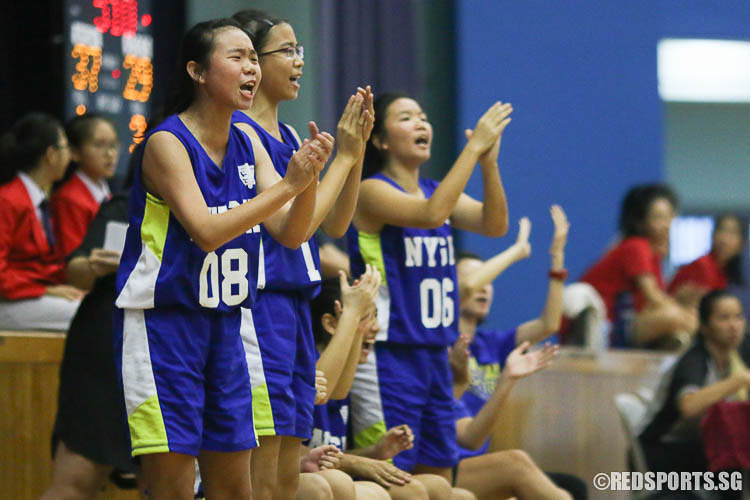 NYGH players cheer for their teammates after Tan Qi Qing (#12) scores in 2 free throws. (Photo © Chua Kai Yun/Red Sports)