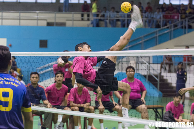 A player of Queensway in action doing a spike. (Photo 4 © Jerald Ang/Red Sports)