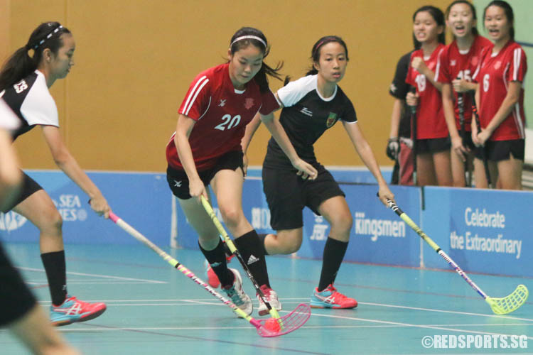 Lim Shing (HCI #20) controls the ball against Raffles players. (Photo © Chua Kai Yun/Red Sports)