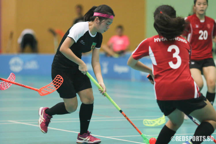 Cheryl Lee (#9) steers the ball nearer to goal. (Photo © Chua Kai Yun/Red Sports)