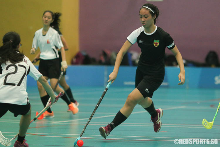 Rachel Park (RJC #13) dribbles the ball nearer to goal. (Photo © Chua Kai Yun/Red Sports)