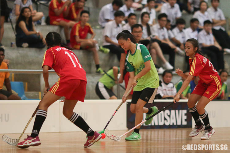 Beverlyn Tan (OP#22) dribbles the ball against Bukit Merah Secondary. (Photo © Chua Kai Yun/Red Sports)
