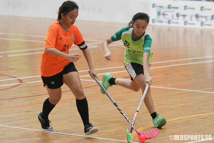 Beverlyn Tan (OPSS #22) attempts to steal possession. (Photo © Chua Kai Yun/Red Sports)