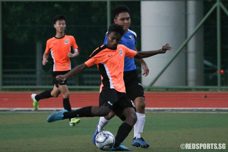 SAJC #8 kicking a successful goal. (Photo © Chua Kai Yun/Red Sports)