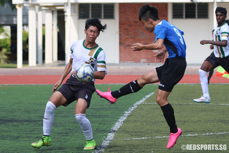 Leow Chun Kiat (#9) of ACJC attempts a shot. (Photo © Chua Kai Yun/Red Sports)